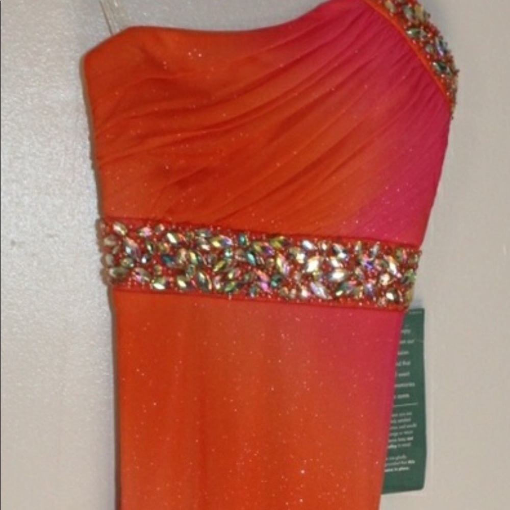 Brand new prom dress by My Michelle. Size 1. BEAUTIFUL